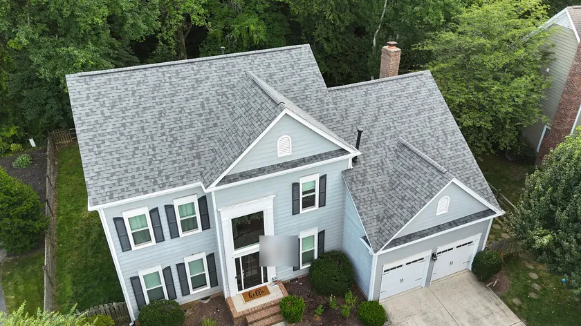 Drone view of the same Ballantyne home with its new grey architectural shingle roof finished